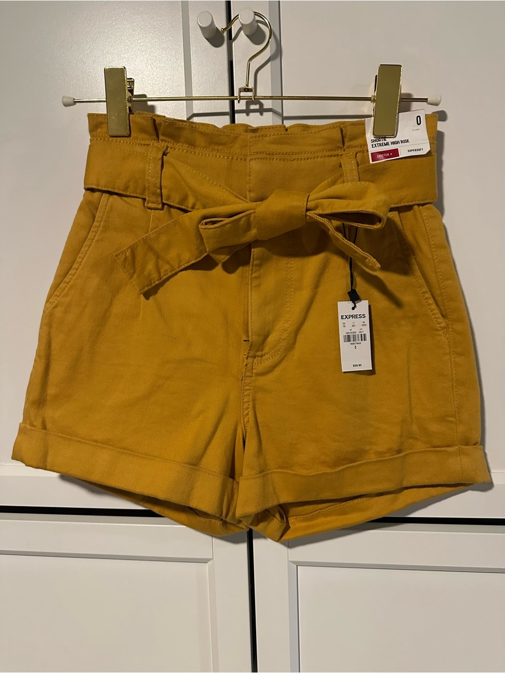 Express High-Waist Paperbag Shorts in Mustard Yellow